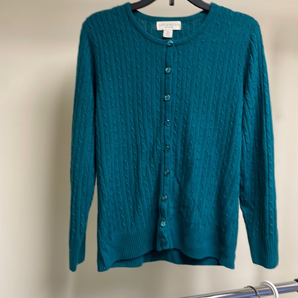 Appleseed’s green cardigan